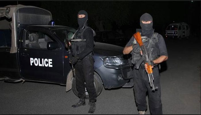 Masked CTD Balochistan officials stand alert with their weapons. Photo: File