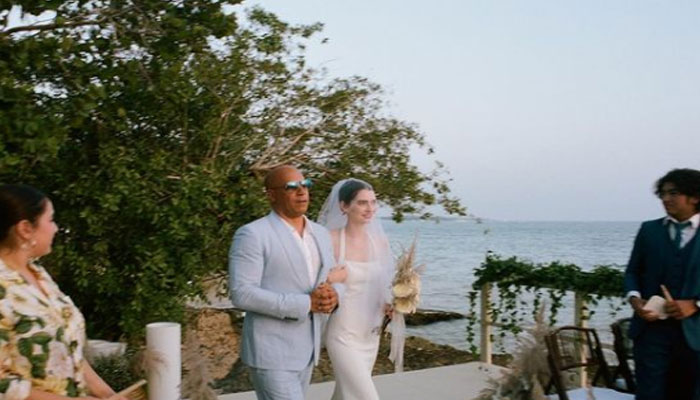 Paul Walkers daughter Meadow walks to her wedding with god father Vin Diesel