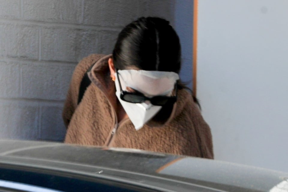 Kendall Jenner sparks plastic surgery talk after leaving doctors office in full face mask