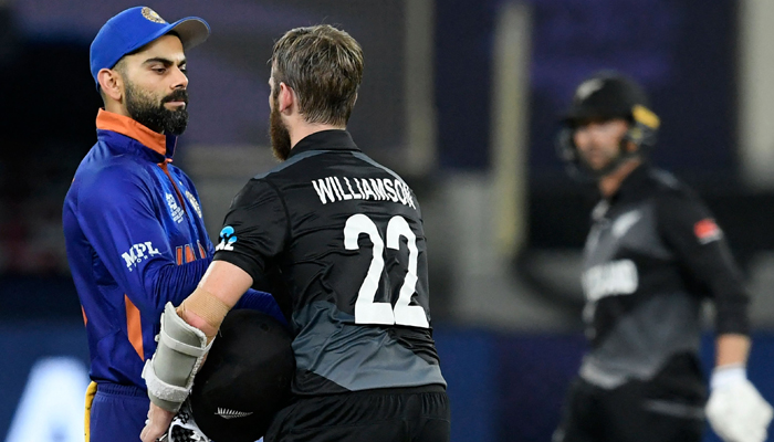 India´s captain Virat Kohli (3R) along with his teammate Rohit Sharma (2R) greet New Zealand´s captain Kane Williamson (2L) at the end of the ICC Twenty20 World Cup cricket match between India and New Zealand at the Dubai International Cricket Stadium in Dubai on October 31, 2021.  — AFP/File