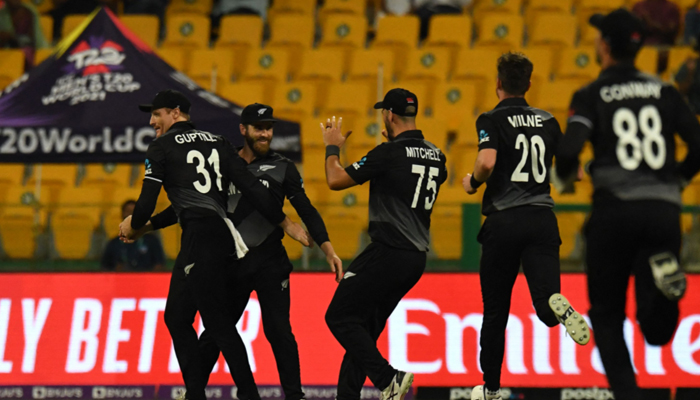 New Zealand´s players celebrate after the dismissal of England´s Jonny Bairstow (not pictured) during the ICC menâ€™s Twenty20 World Cup semi-final match between England and New Zealand at the Sheikh Zayed Cricket Stadium in Abu Dhabi on November 10, 2021. — AFP