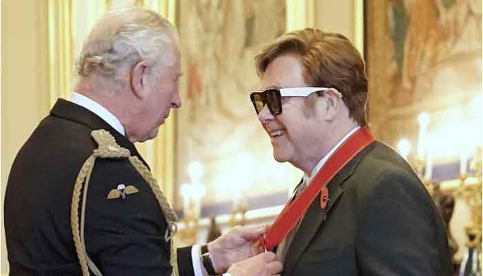 Elton John receives elite royal honour from Prince Charles
