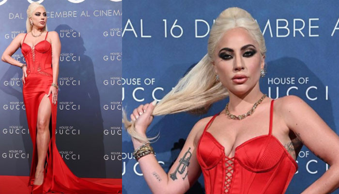Lady Gaga mendesis dalam gaun merah cerah di karpet merah ‘House of Gucci’
