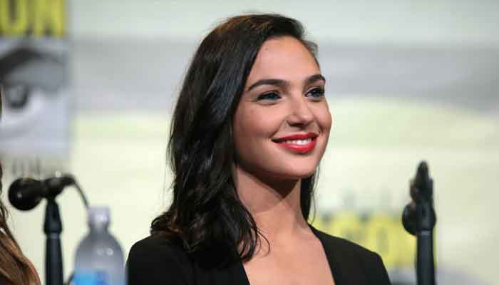 Gal Gadot reacts to picture with Emilia Clarke and Jason Momoa