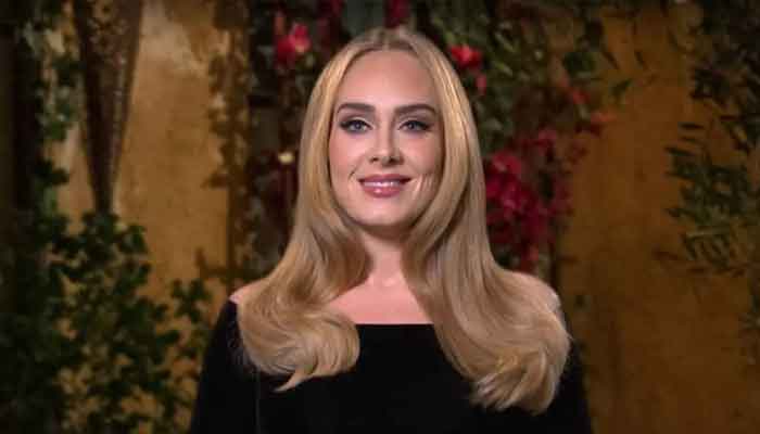 Adele clinches number one spots for singles and albums