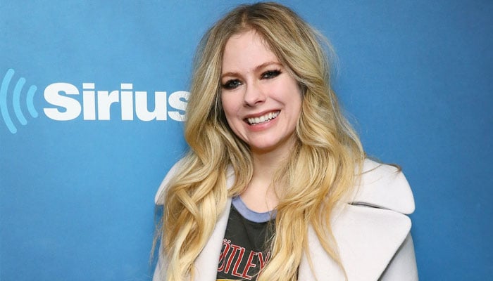 Avril Lavigne explains how hard she worked to ‘resist’ falling in love with Mod Sun