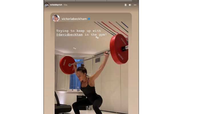 Victoria Beckham showcases her strength in black sportswear during weightlifting session