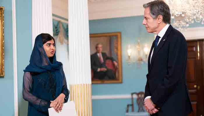 Malala Yousafzai, Pakistani activist for female education and a Nobel Peace Prize laureate accompanied by Secretary of State Antony Blinken, speaks in the Treaty Room at the State Department in Washington on December 6, 2021. -AFP
