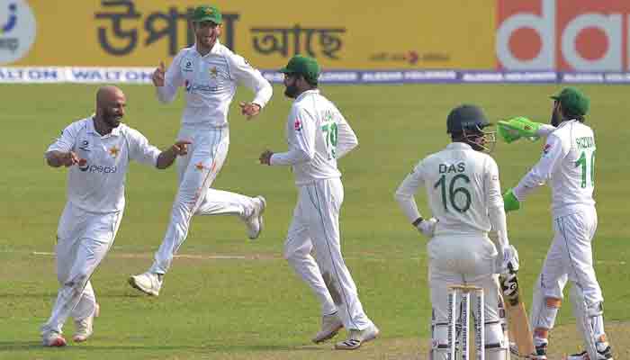 Pakistan spinner Sajid Khan celebrates after taking wicket of a Bangladeshi batter. -AFP