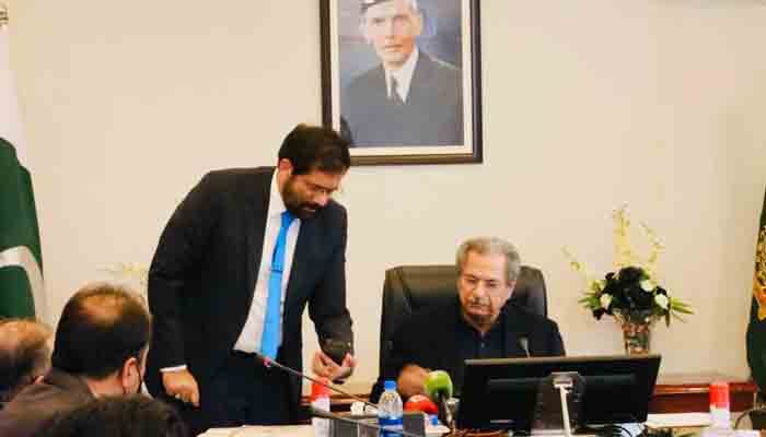 Federal Minister for Education Shafqat Mehmood can be seen during the launching ceremony of the digital equivalence certificate verification in Islamabad. — Twitter
