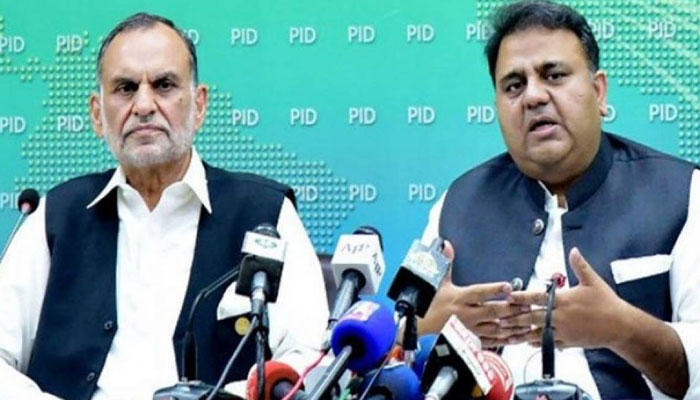 Railways Minister Azam Swati (L) and Information Minister Fawad Chaudhry (R) address a joint press conference. Photo: PID/file