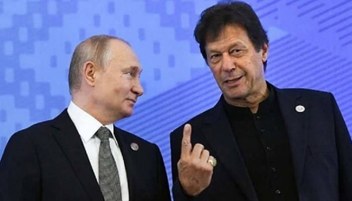 Prime Minister Imran Khan and Russian President Vladimir Putin speak prior to a meeting of the Shanghai Cooperation Organisation (SCO) Council of Heads of State in Bishkek on June 14, 2019. — AFP/File