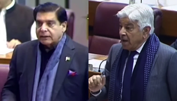 PPP leader and former prime minister Raja Pervaiz Ashraf (L) and PML-N leader Khawaja Asif speak during a session of the National Assembly, in Islamabad, on December 29, 2021. — YouTube