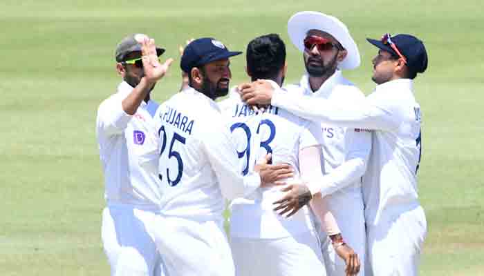 Indian players congratulate Jasprit Bumrah after taking a wicket of a South African player. -BCCI