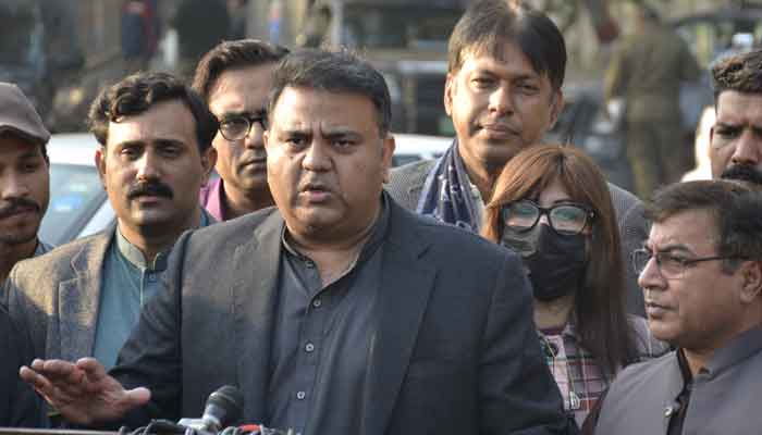 Minister for Information and Broadcasting Fawad speaking to reporters in Lahore, on December 31, 2021. — PID
