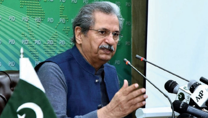 Minister for Federal Education and Professional Training Shafqat Mehmood addressing a press conference in this APP file photo.