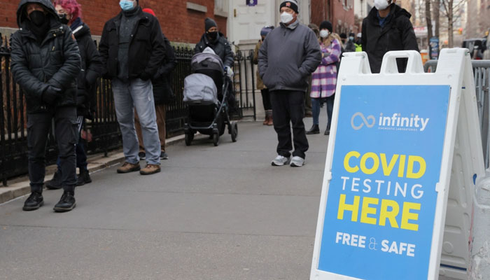 People queue for a COVID-19 test as the Omicron coronavirus variant continues to spread in Manhattan, New York. Agencies