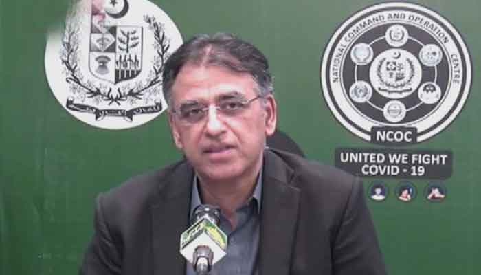Federal Minister for Planning Asad Umar speaks to media after chairing a meeting at the National Command and Operation Centre (NCOC). -Screengrab Geo News