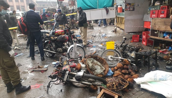 Burnt motorcycles are seen in Anarkali Bazaar, Lahore, where an explosion occurred, on January 20, 2022. — Twitter