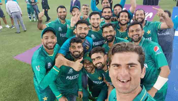 The Pakistani squad can be seen taking a selfie after beating India by 10 wickets in T20 World Cup 2021. — Twitter/TheRealPCB