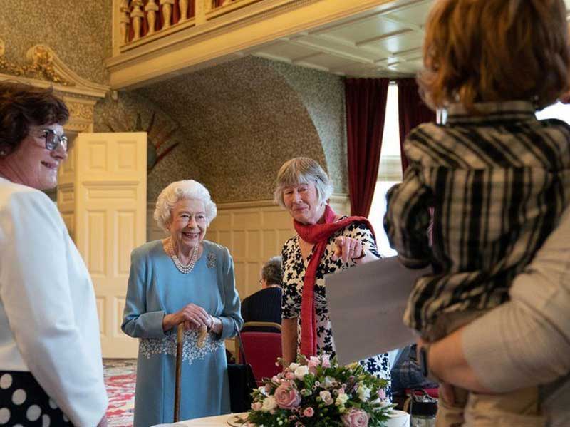 Queen marks her Platinum Jubilee in style, cuts cake with volunteers