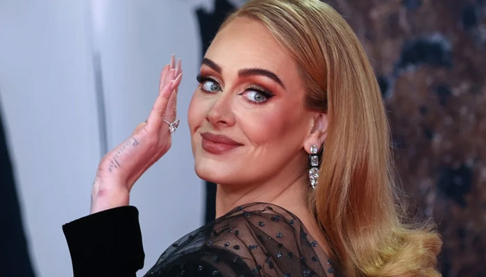 Adele sparks engagement rumours, spotted with new ring at BRIT Awards