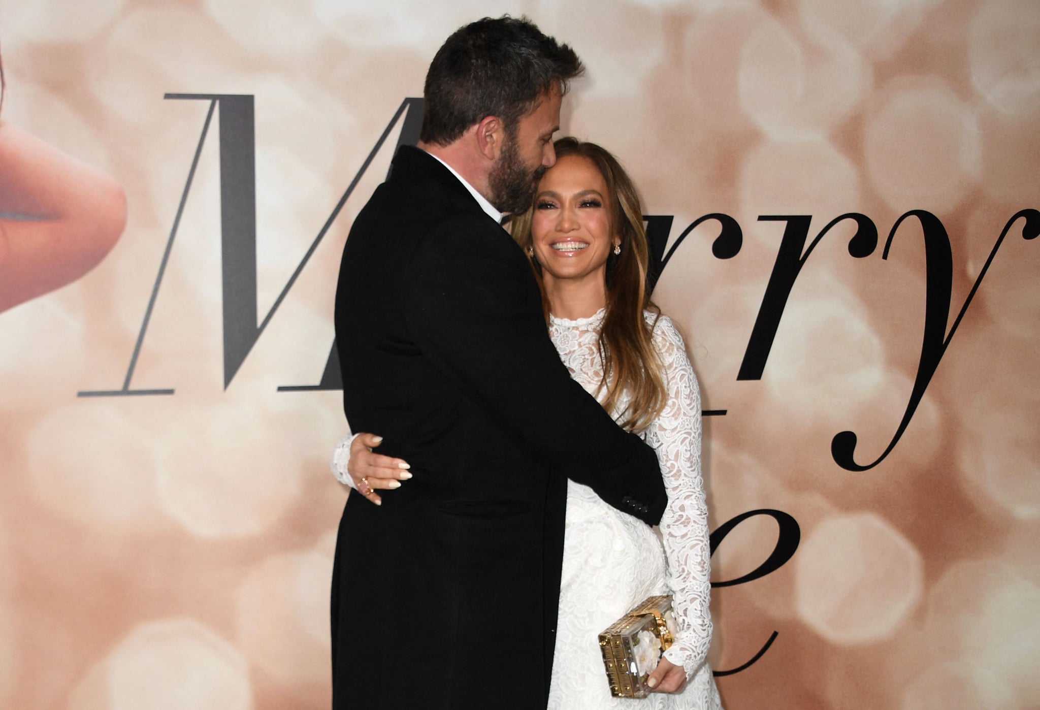 Jennifer Lopez drops jaws in white mini lace dress at ‘Marry Me’ premiere with Ben Affleck