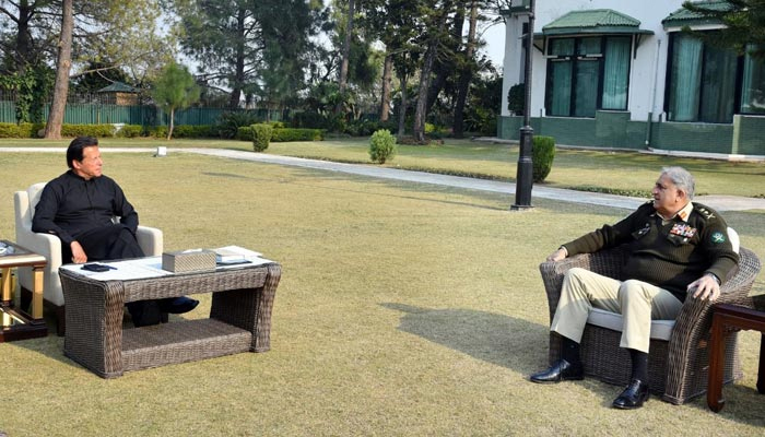 Prime Minister Imran Khan (left) and Chief of Army Staff General Qamar Javed at the PMs Office in Islamabad, on February 14, 2022. — PM Office