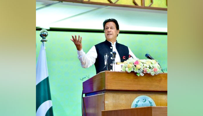 Prime Minister Imran Khan addressing the 48th session of the Council of Foreign Ministers of the Organization of Islamic Cooperation (OIC) in Islamabad on March 22, 2022.  - APP