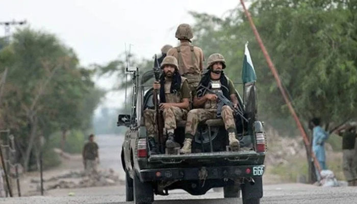 Image showing Pakistan army soldiers sitting in a van. —  AFP/file