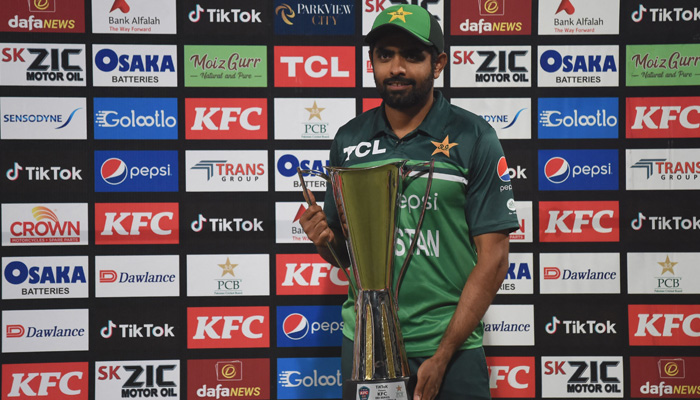Pakistan´s captain Babar Azam poses with the trophy after winning the one-day international (ODI) cricket match series against Australia at the Gaddafi Cricket Stadium in Lahore on April 2, 2022. AFP