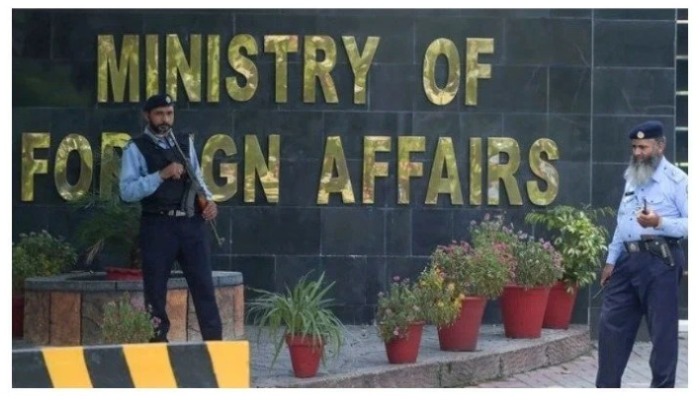 Two guards stand outside of the Ministry of Foreign Affairs office in Islamabad, Pakistan. — AFP/ file