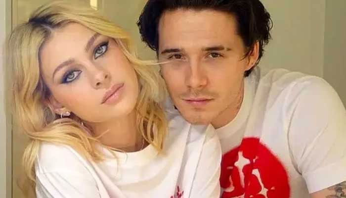 Brooklyn Beckham poses for infectious PDA with wifey Nicola Peltz