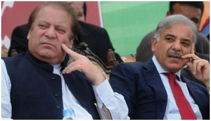 PML-N supremo Nawaz Sharif (R) and Prime Minister Shehbaz Sharif (L). — AFP/ file