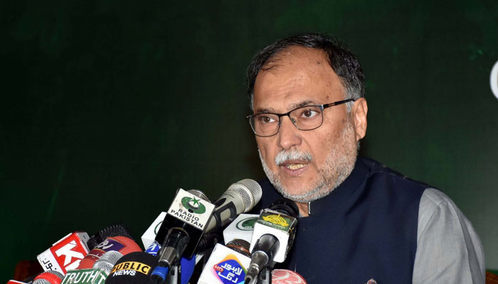 Minister for Planning and Development Ahsan Iqbal addressing the media in Lahore. Photo: PID