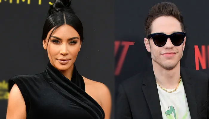 Kim Kardashian spellbinds Pete Davidson in scoop-neck gown and low ponytail during night out