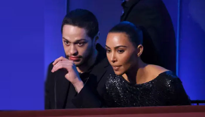 Kim Kardashian spellbinds Pete Davidson in scoop-neck gown and low ponytail during night out