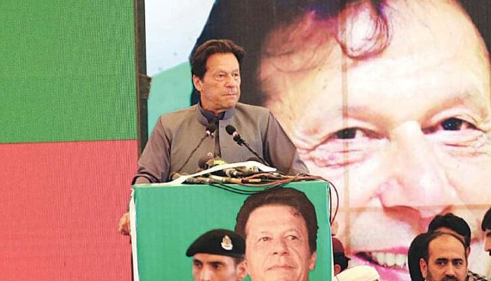 PTI Chairman Imran Khan addresses a workers’ convention at CM House on Tuesday.—PPI