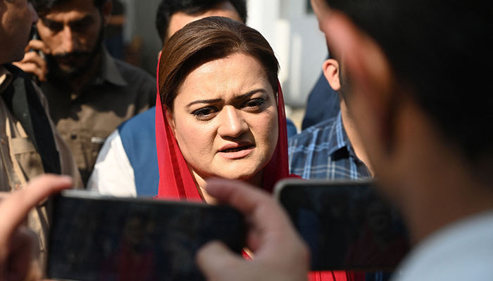 Information Minister Marriyum Aurangzeb arrives at the Parliament House building in Islamabad on April 3, 2022. — AFP