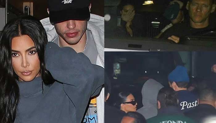 Kim Kardashian and Pete Davidson try to hide their face as they make hasty exit from LAs theatre