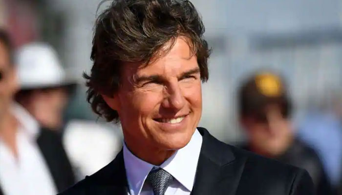 Tom Cruise becomes real-life hero as the actor saves reporter from falling off podium
