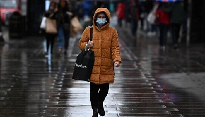 Image showing a person wearing a mask. — AFP/file