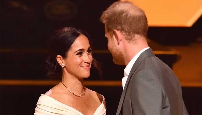 Meghan Markle and Prince Harry could be booed if they take part in the Queens balcony appearance