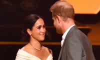 Meghan Markle and Prince Harry could be 'booed' if they take part in the Queen's balcony appearance