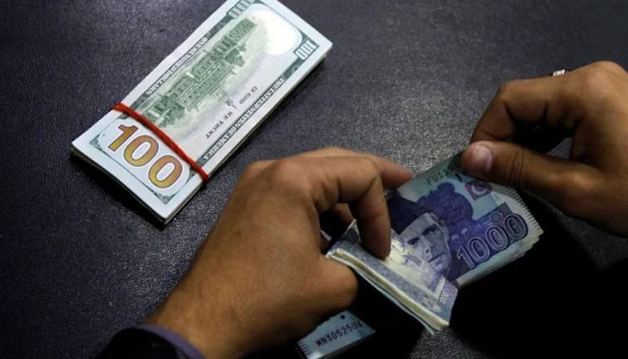 The Pakistani rupee crosses the 200 mark against the US dollar in the interbank trade. Photo: file