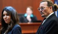 Why is Johnny Depp 'flirting' with his lawyer in court? Body language expert reveals