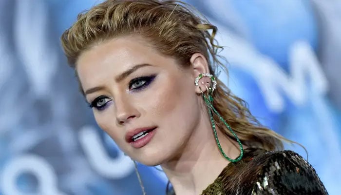 Amber Heard revealed friends warn her lovers about romancing her