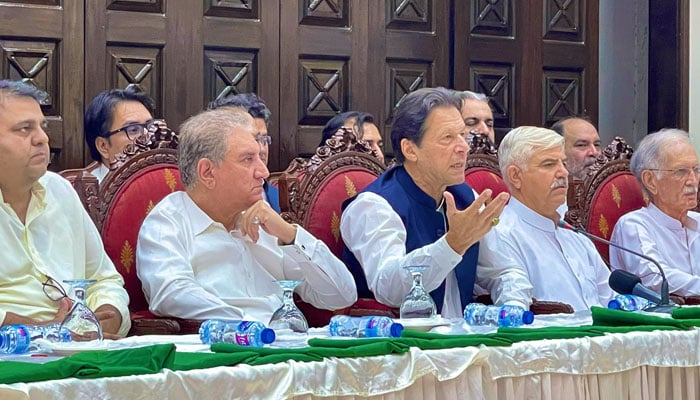 PTI Chairman Imran Khan addressing a press conference in Peshawar after chairing his partys Core Committee meeting. Photo: PTI/Twitter