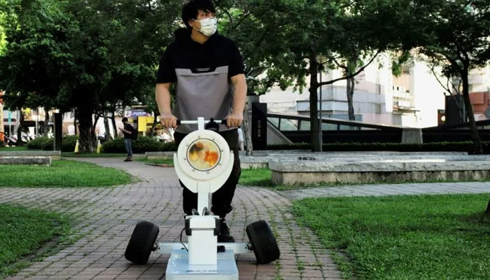 Huang is fairly confident his goldfish enjoy the stroller adventures. Photo: AFP