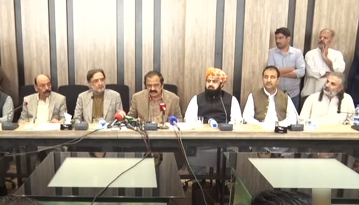Interior Minister Rana Sanaullah (centre) adrresses a press conference flanked by the leaders of the coalition parties in Islamabad, on May 24, 2022. — YouTube/PTV